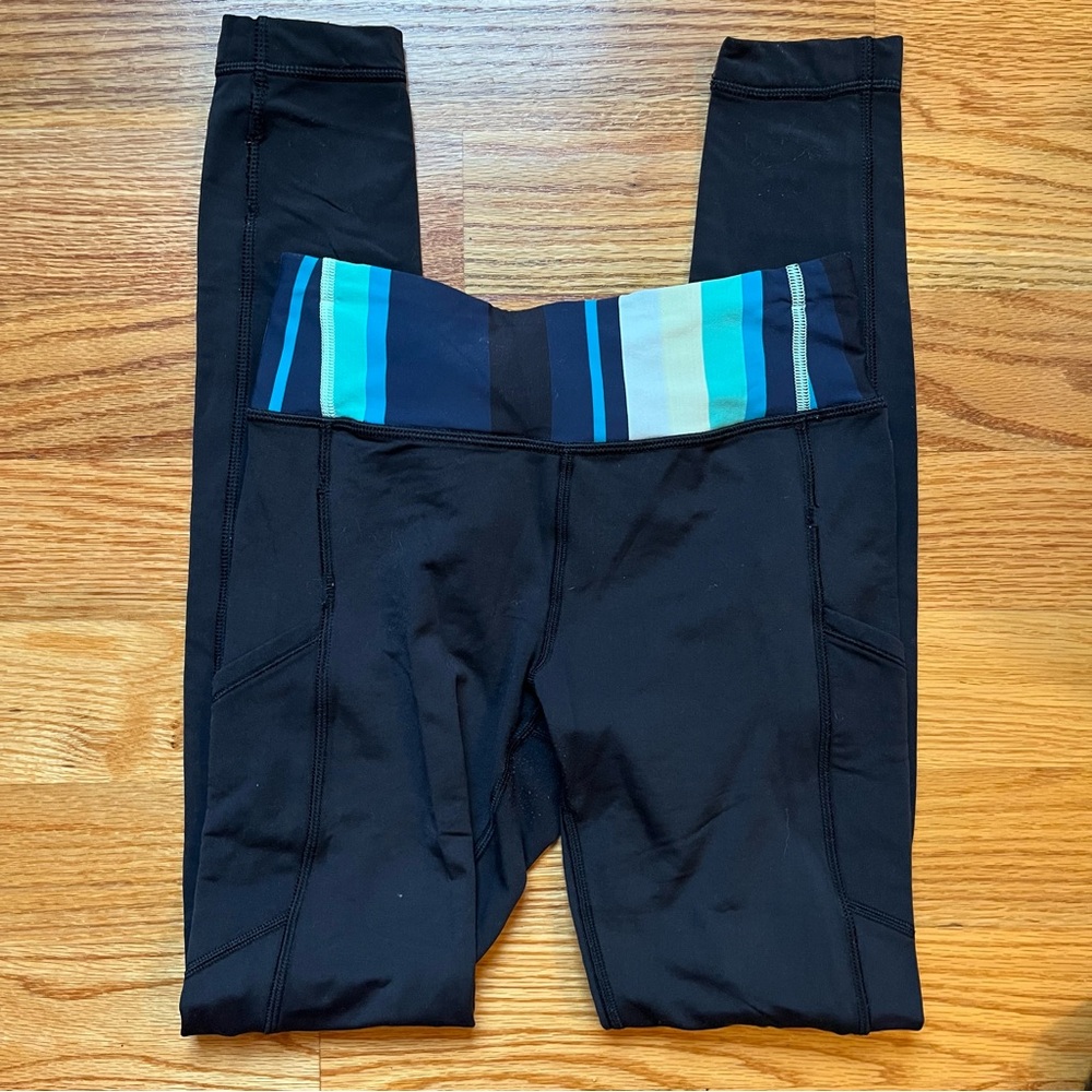 Lululemon black leggings with blue patterned waistband size 4